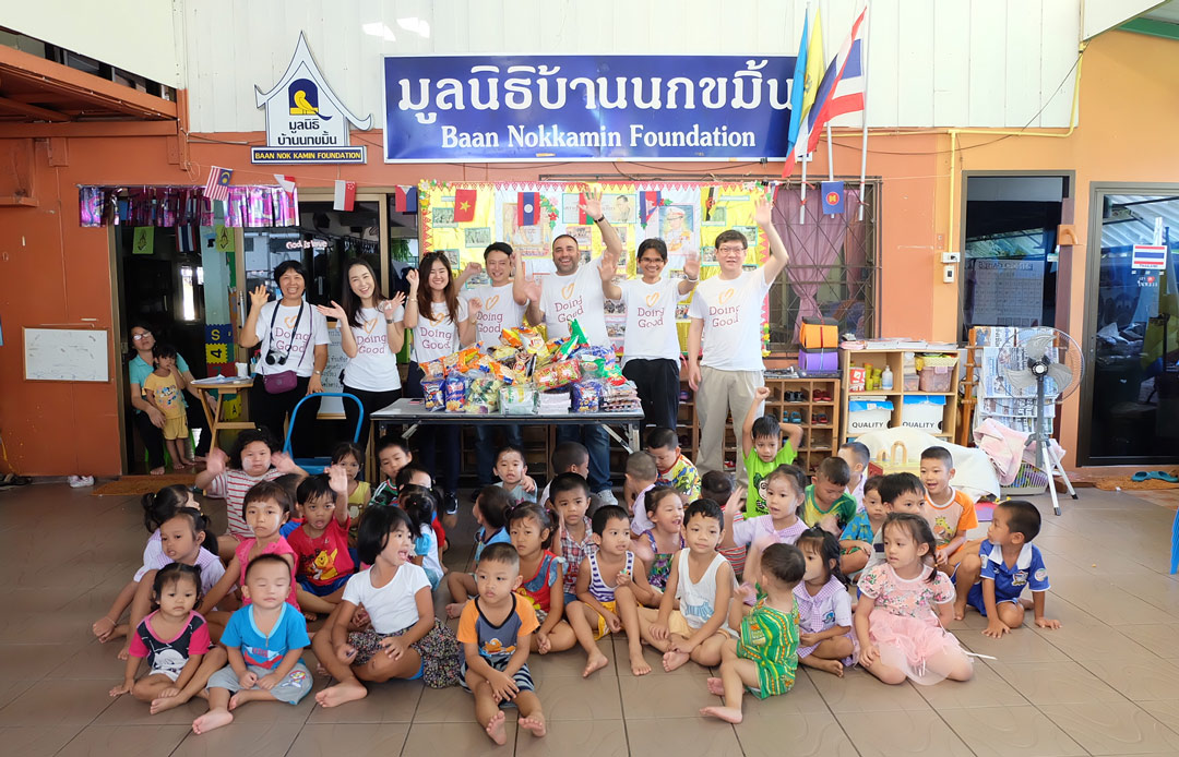 Employees and children at their Good Deeds Day activity