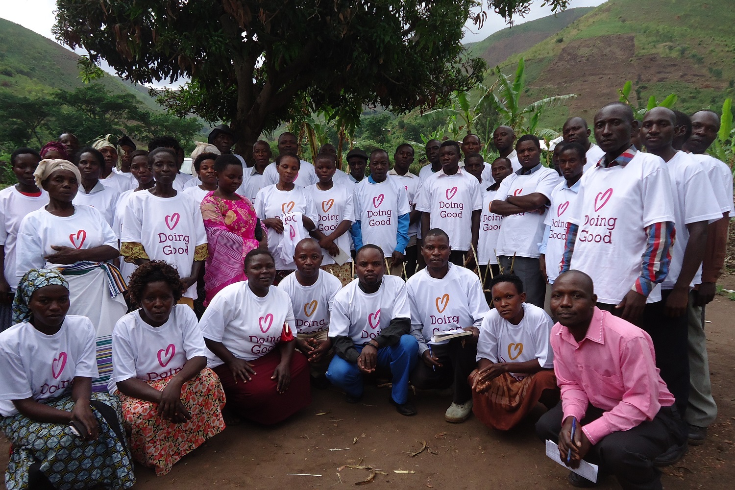 Rwenzori Rural Health Services pose for a moment of gratitude, and a sweet picture.